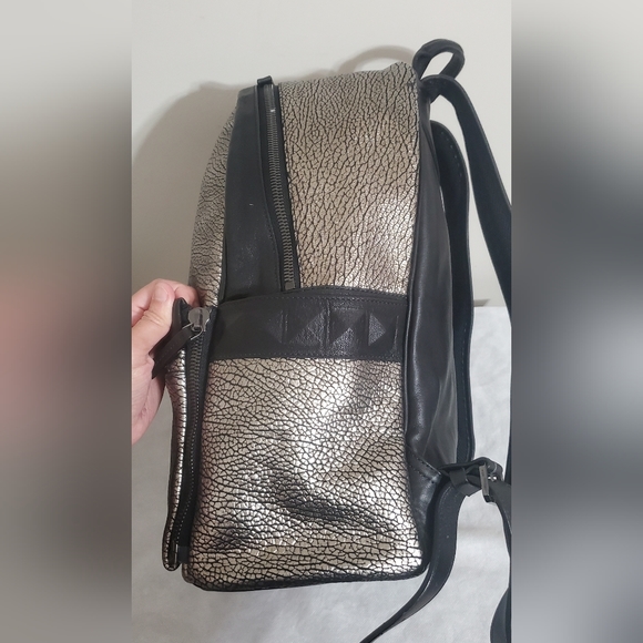 MCM Metallic Gray Cracked Leather Backpack - Picture 10 of 17